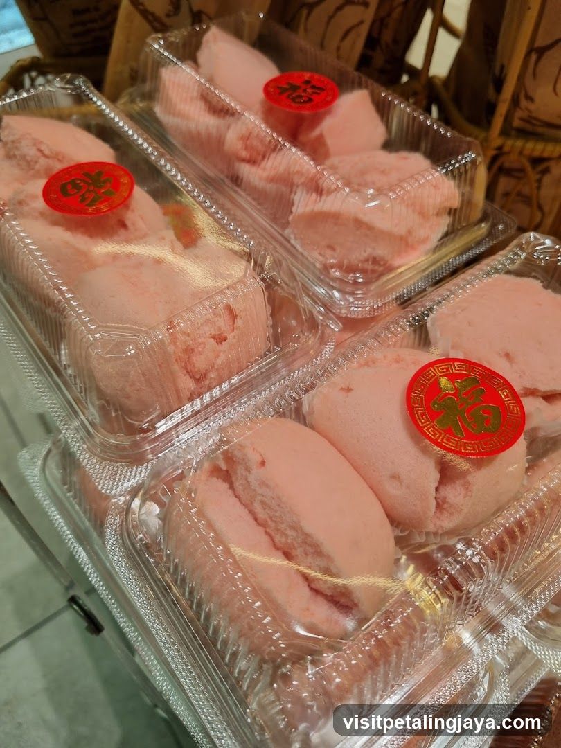 Packaged Pink Pastries with Red Stickers