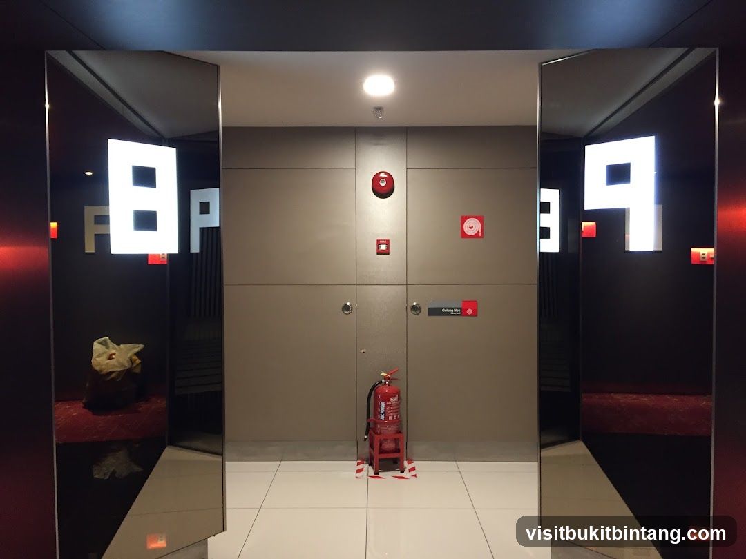 Corridor with illuminated numbers and fire safety equipment
