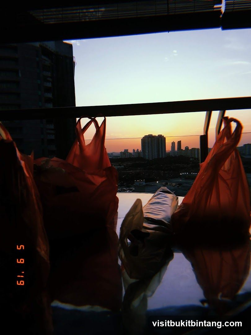 Plastic Bags Against Sunset Cityscape