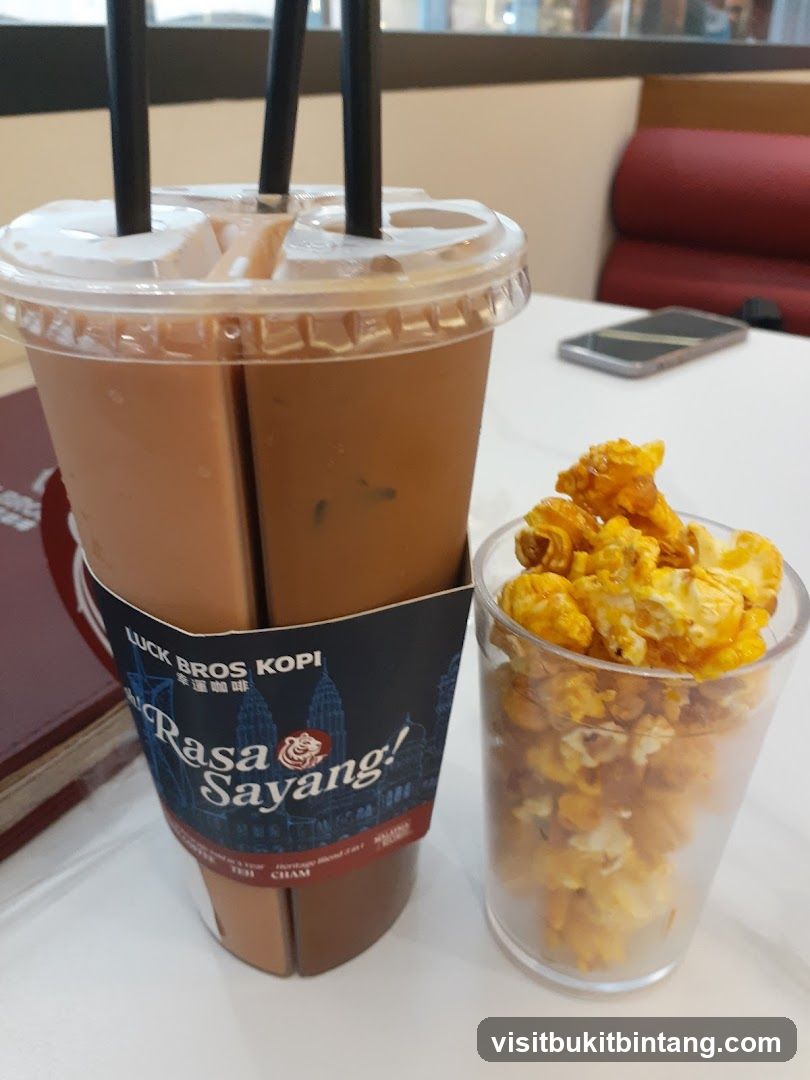 Iced Drink and Popcorn