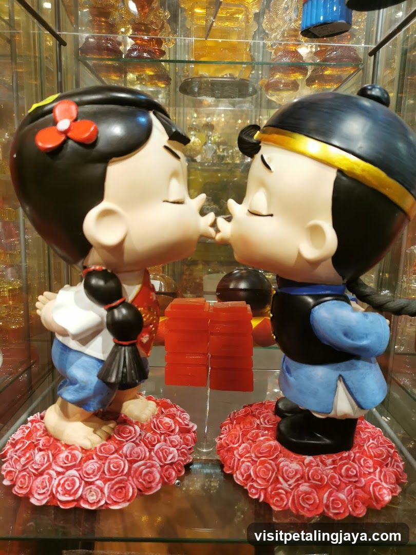 Cute Couple Statues in Display Case