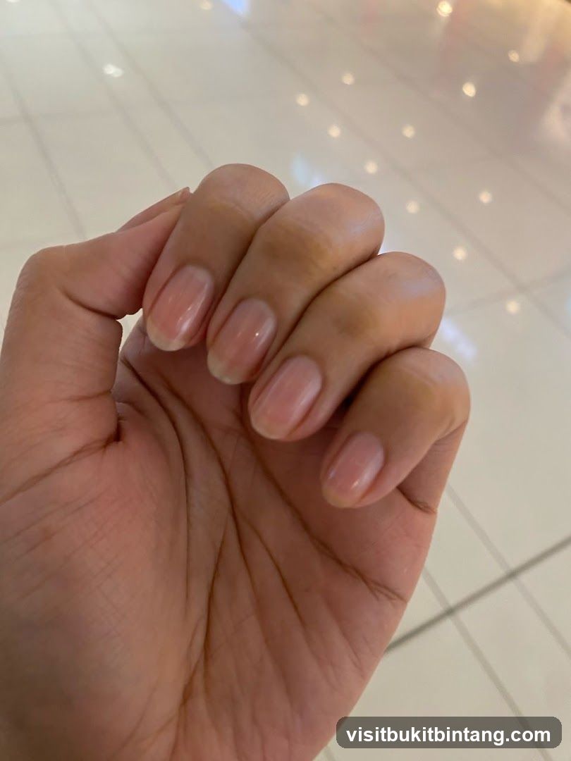 Hand with manicured nails