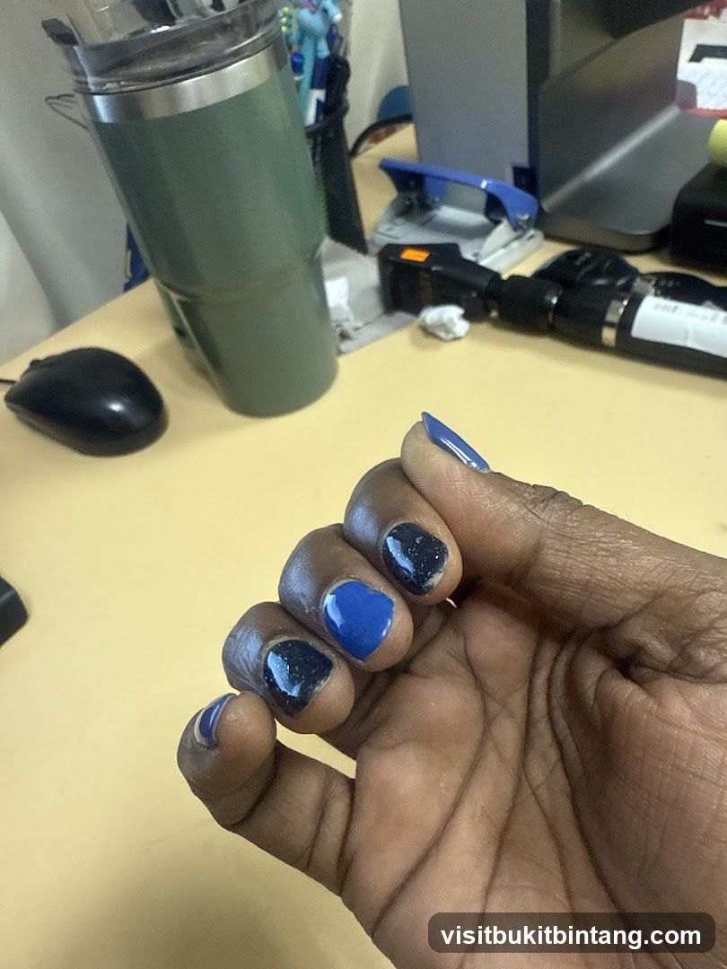 Desk with Hand and Office Supplies