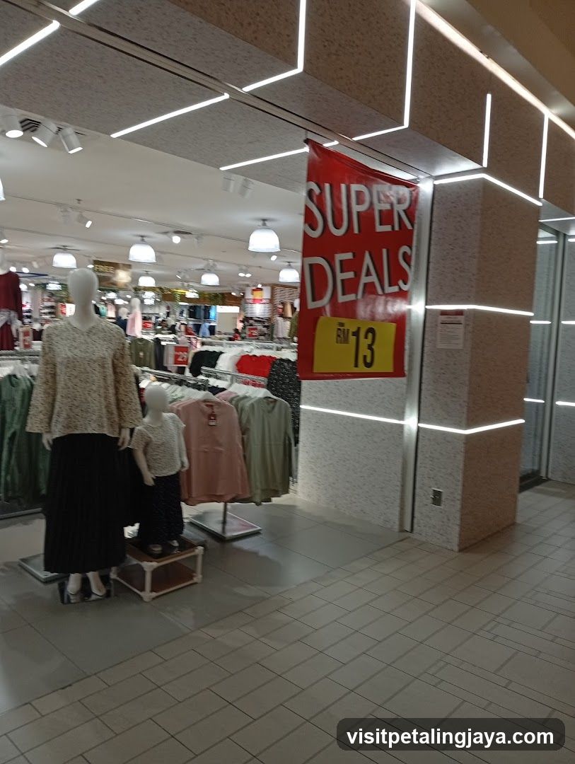 Clothing Store Interior with Super Deals Banner