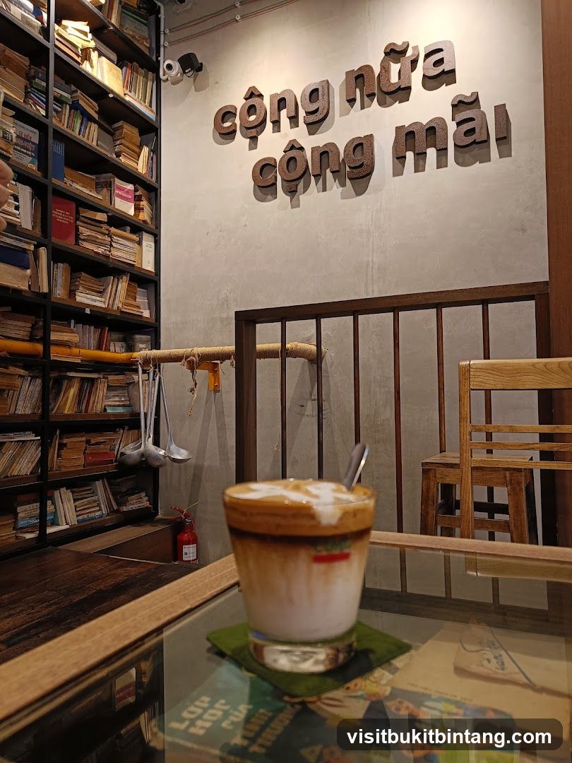 Coffee shop interior with books and drink