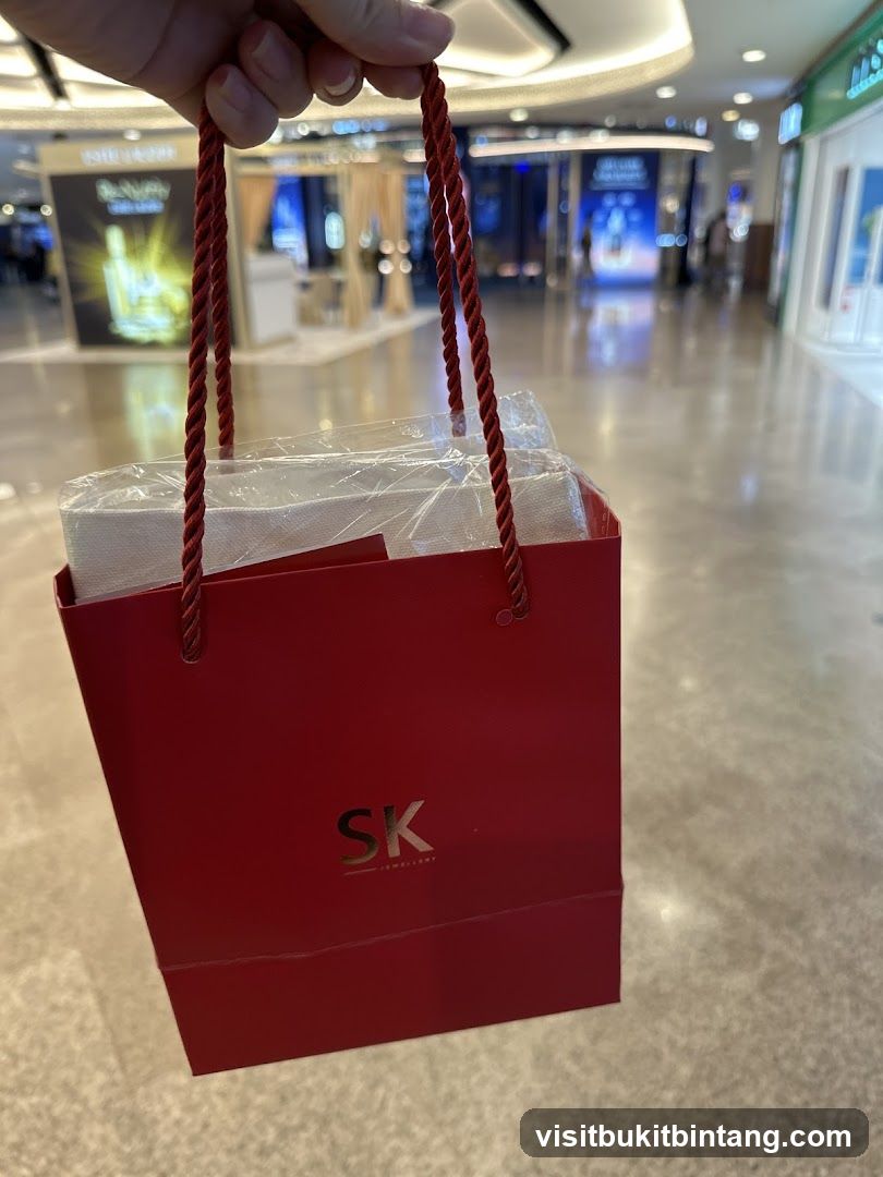 Red Shopping Bag with SK Jewellery Logo