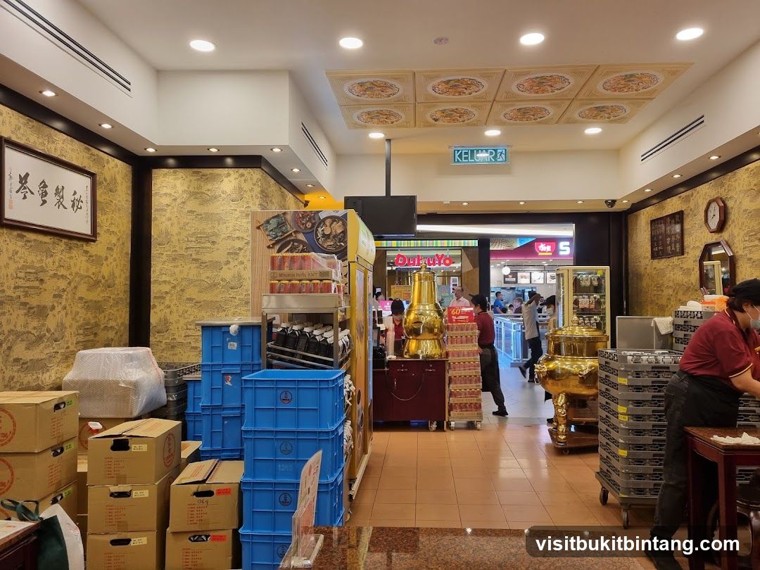 Interior of a store with stacked boxes and display shelves