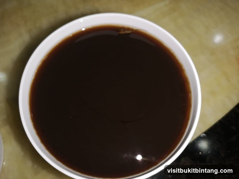 Bowl of dark liquid