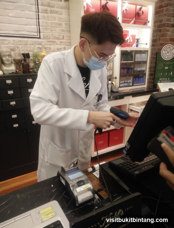 Cashier Scanning Items