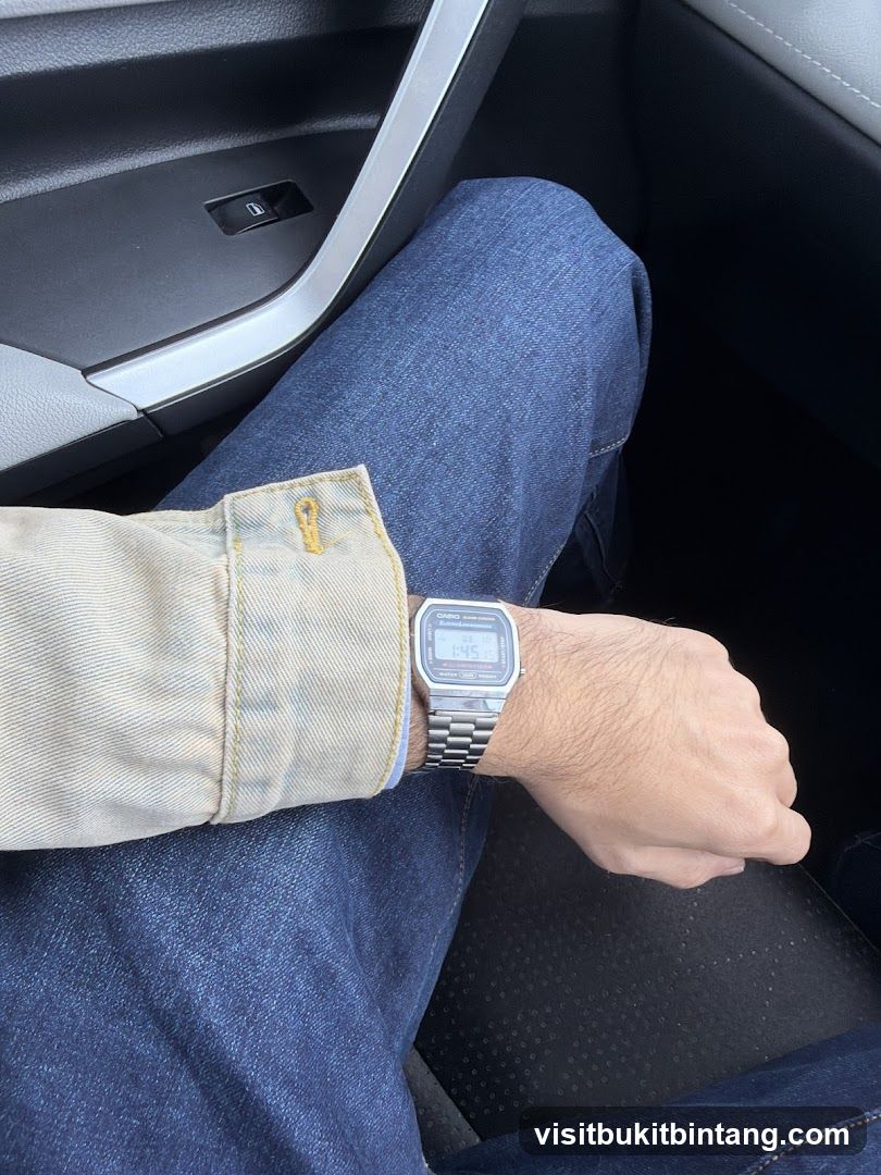 Person wearing a digital watch