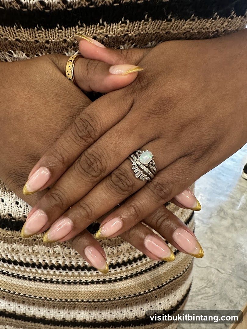 Hands with French Manicure and Rings