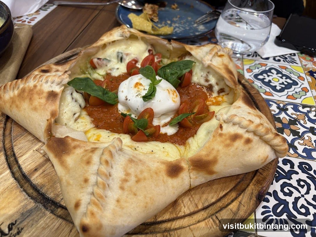 Calzone with Burrata and Tomatoes