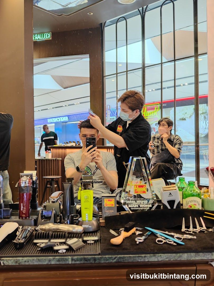 Barber cutting client's hair