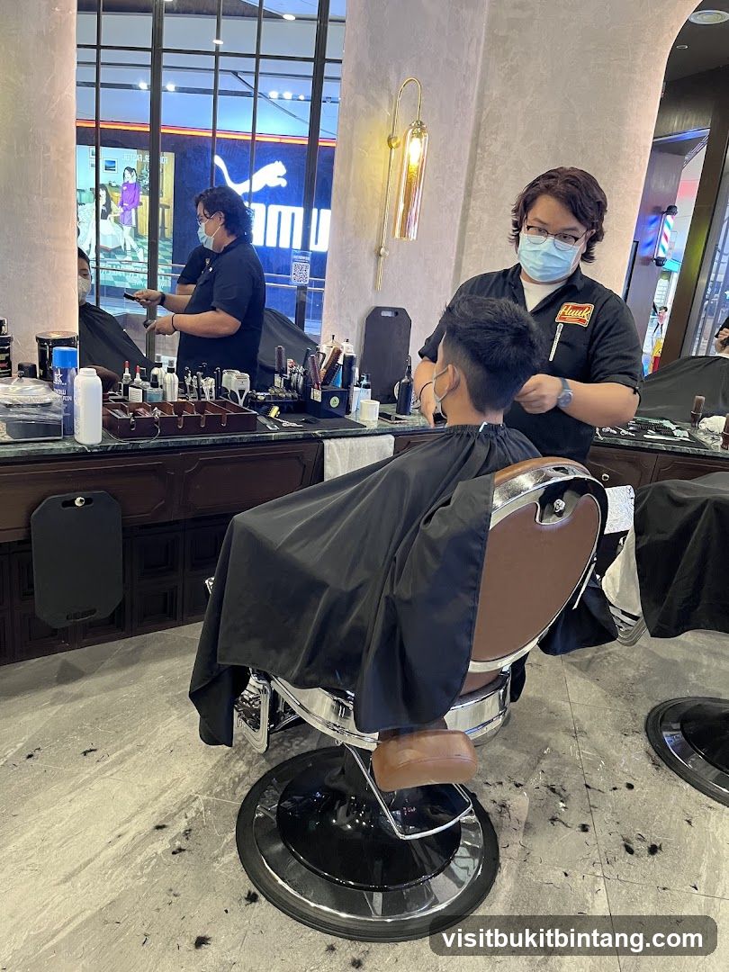 Barber cutting hair