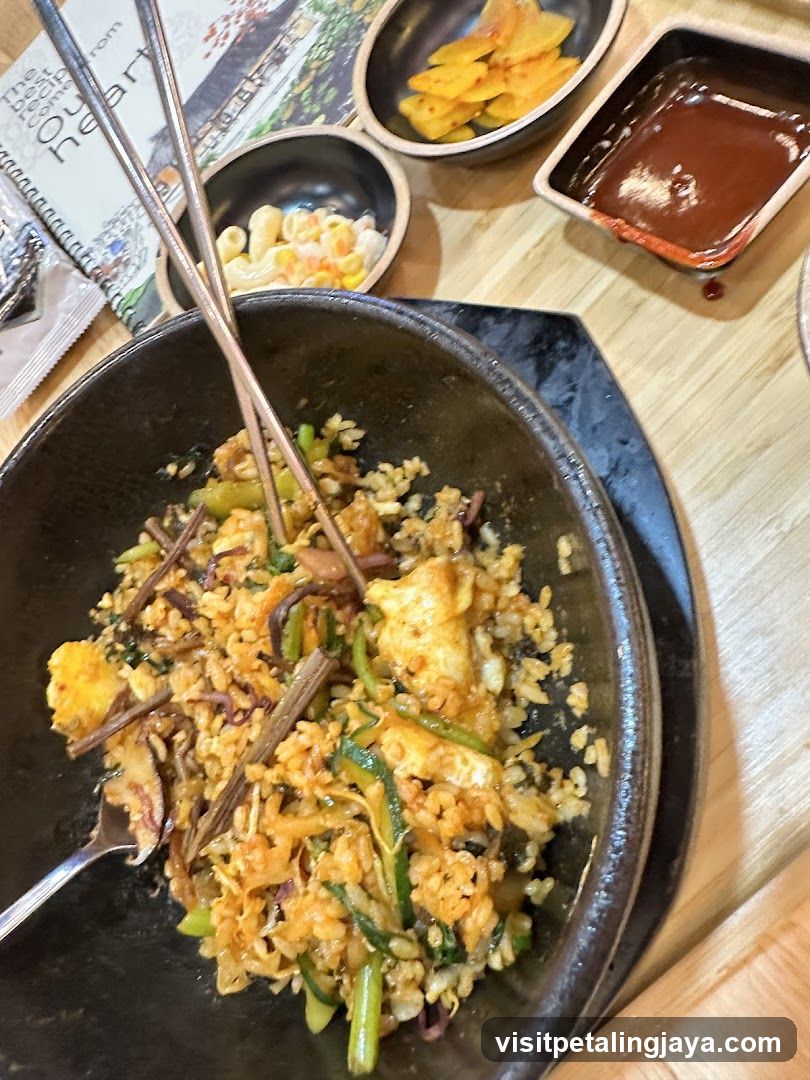 Sizzling Rice Dish with Side Dishes