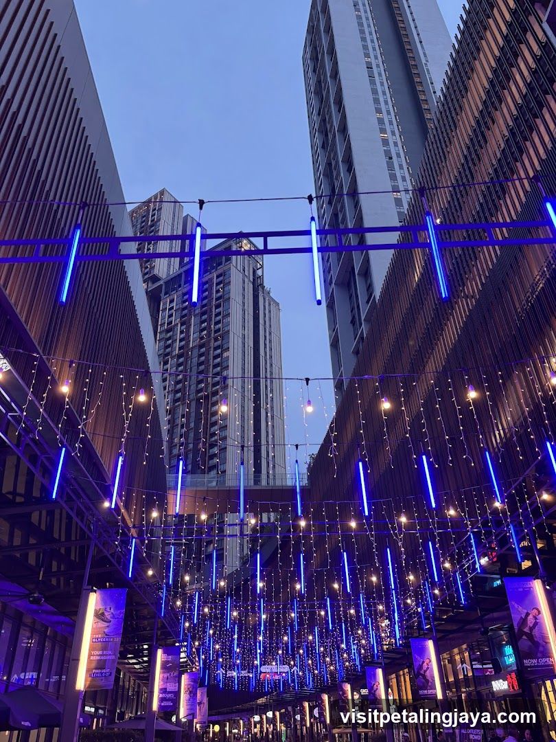 Evening Street Scene with Blue Neon Lights