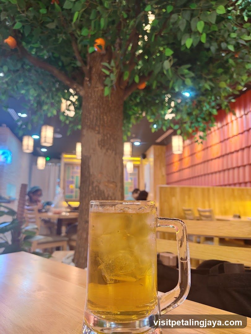 Beer in a restaurant with tree decor