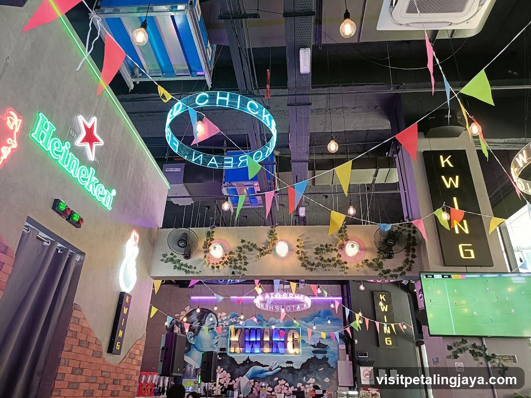 Indoor Bar Interior with Neon Signs and Decorations
