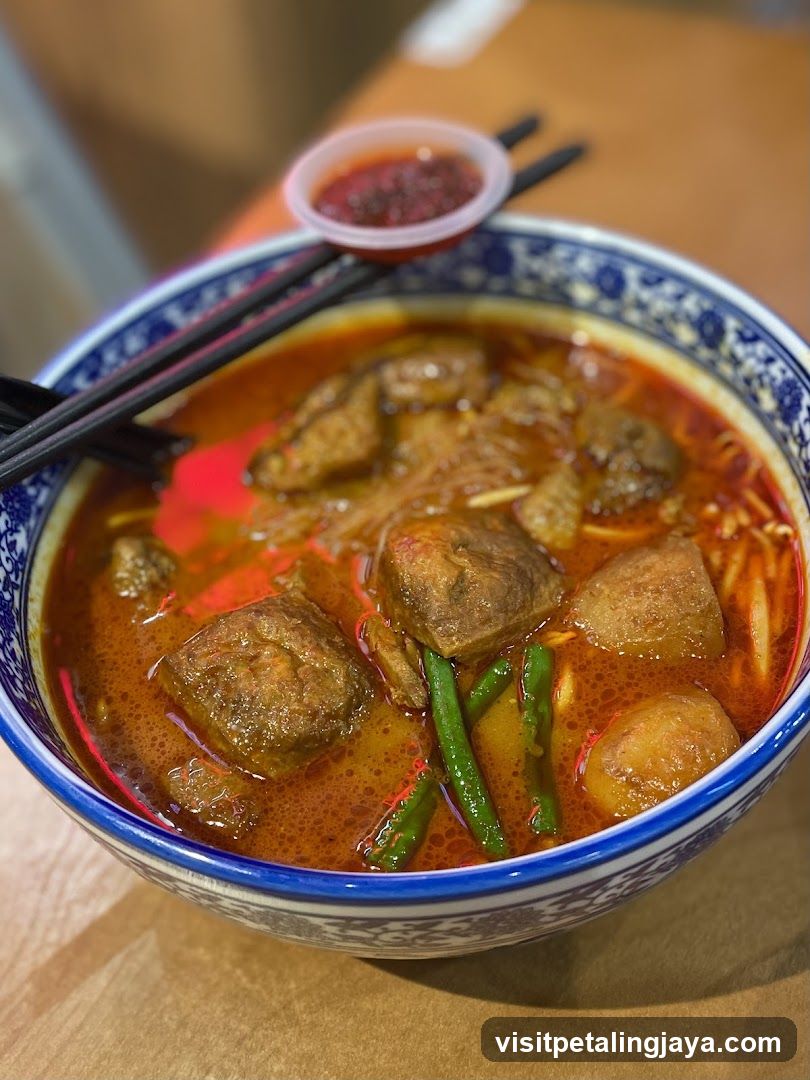 Spicy Noodle Bowl with Meatballs and Green Peppers