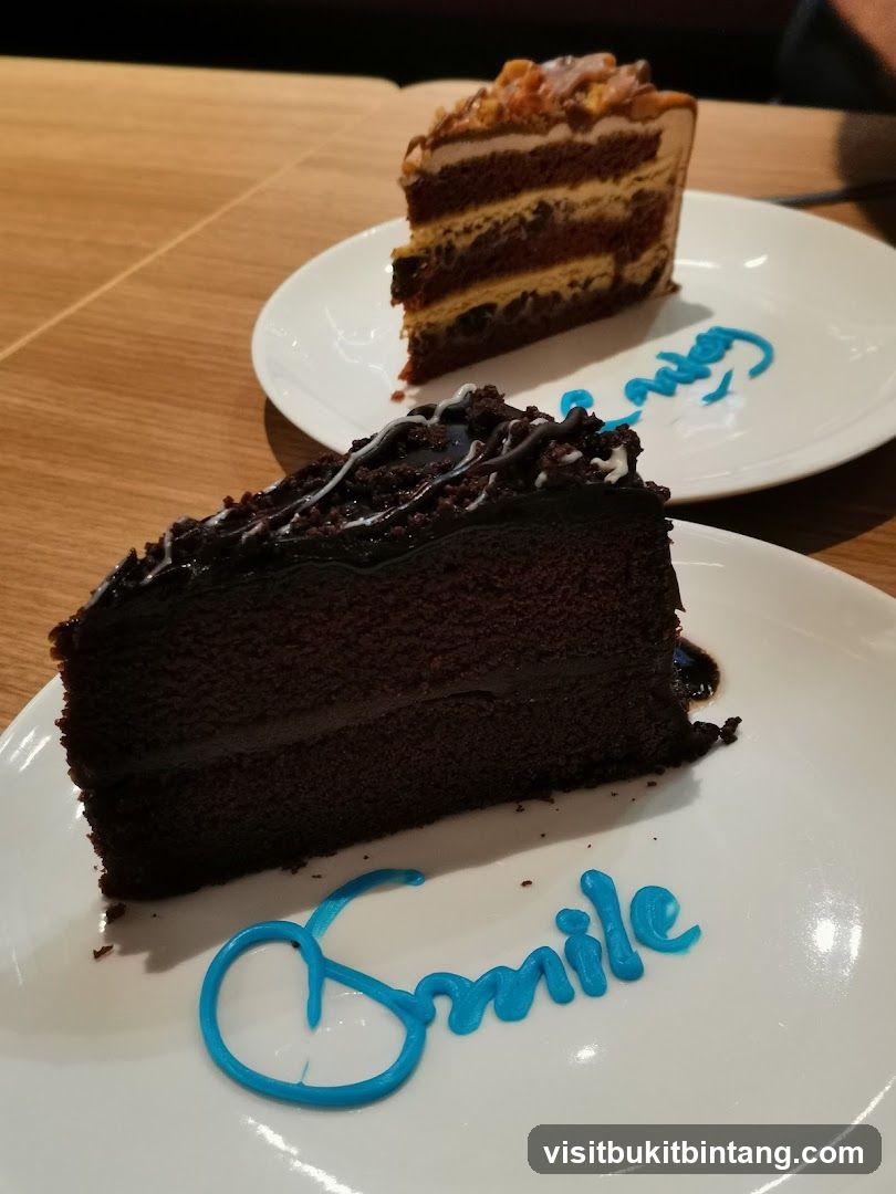 Two slices of cake on plates