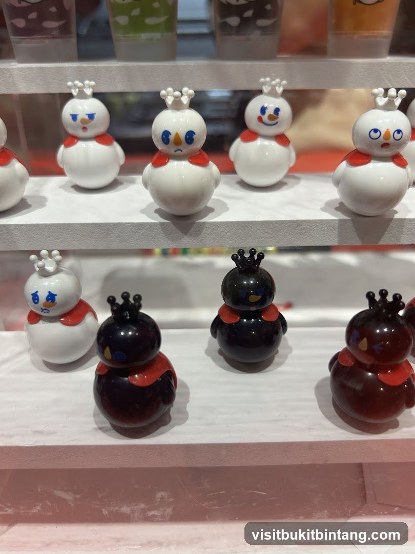Snowman and Penguin Figurines
