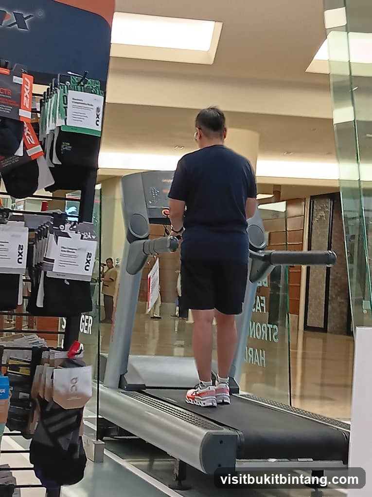 Man on Treadmill in Store