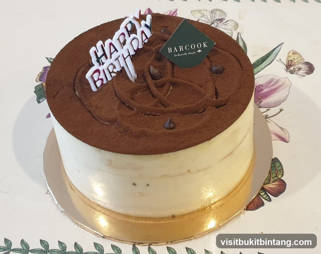 Tiramisu Cake with Happy Birthday Topper