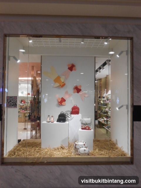 Store Window Display with Fish and Handbags