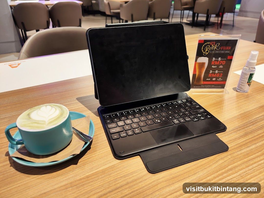 Table with Tablet, Coffee, and Beer Promotion