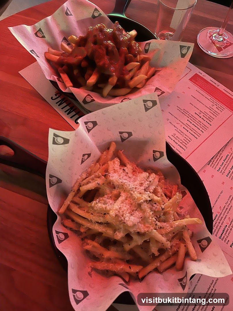 Two plates of fries