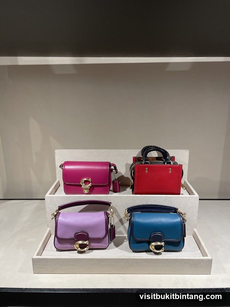 Four Small Handbags