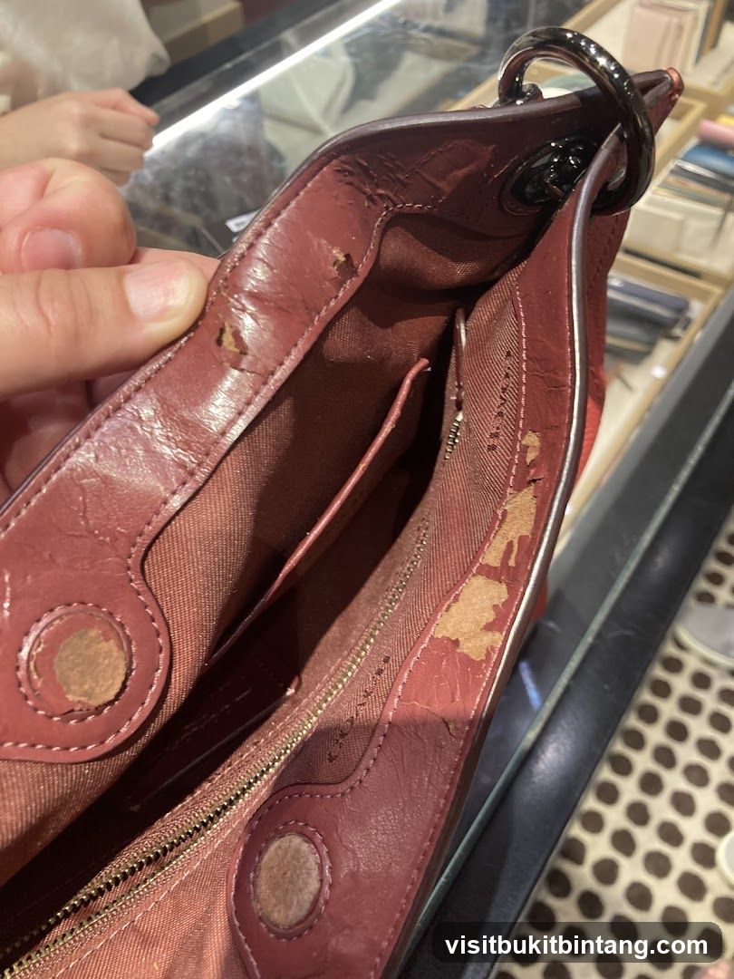 Damaged Red Leather Handbag