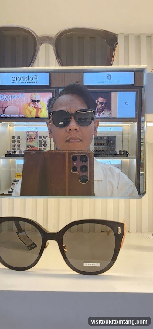 Man trying on sunglasses