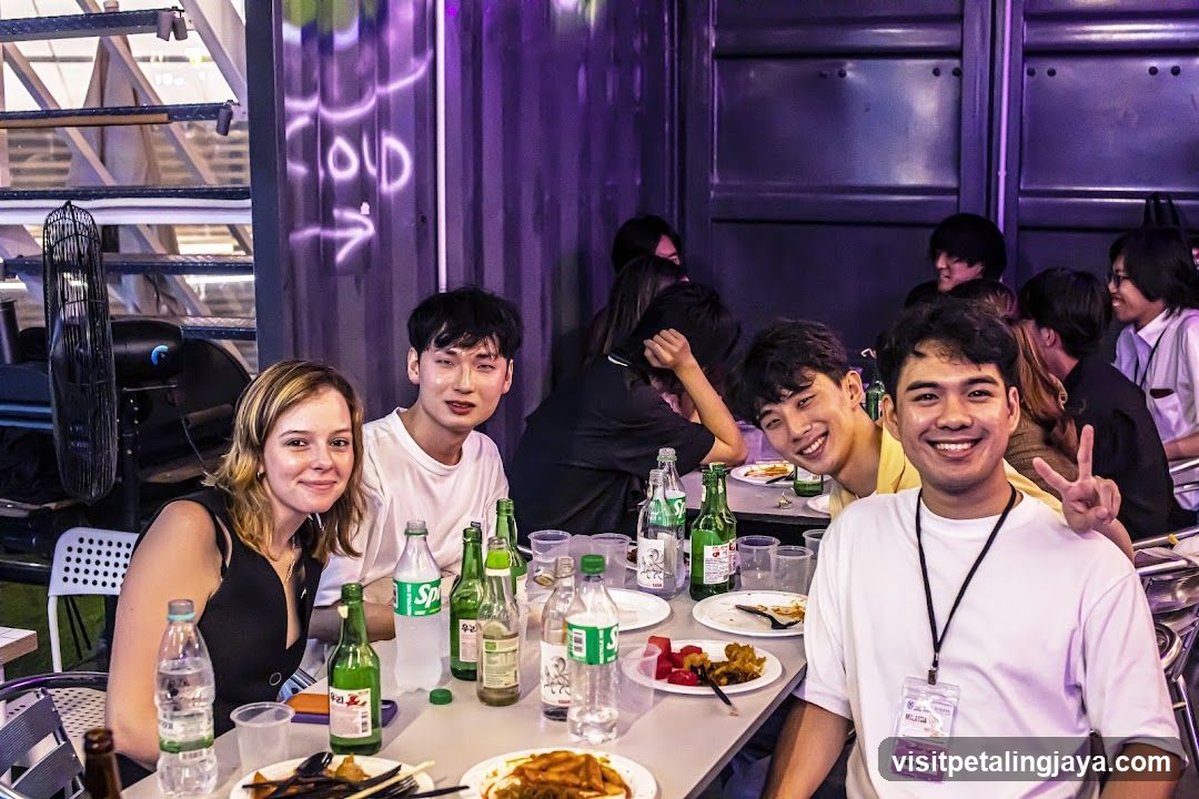 Group of friends dining at an outdoor event