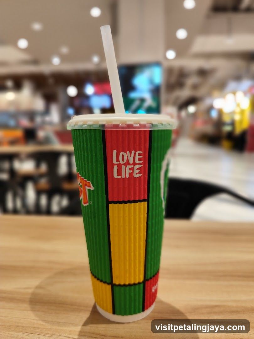 Rastafarian-themed drink cup in mall food court