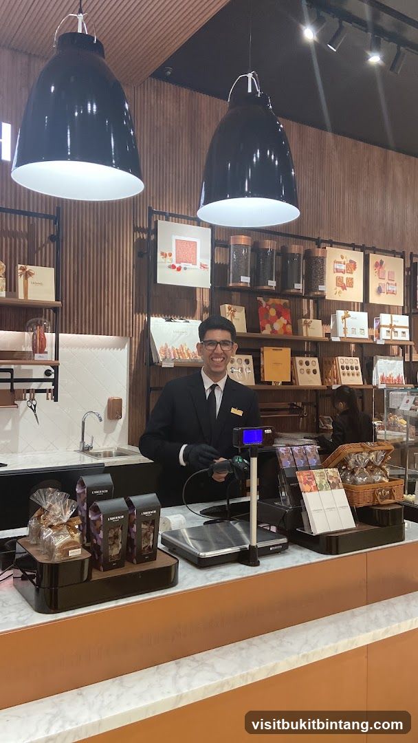 Smiling employee behind a counter