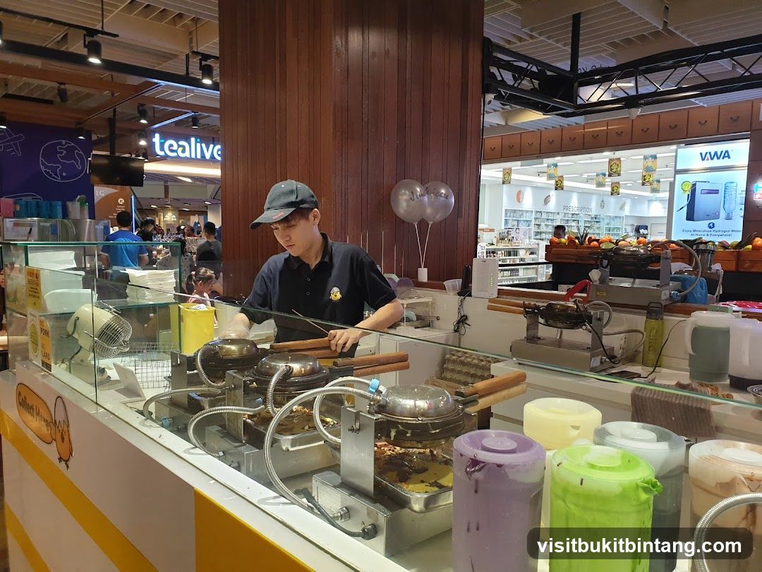 Food stall worker preparing food