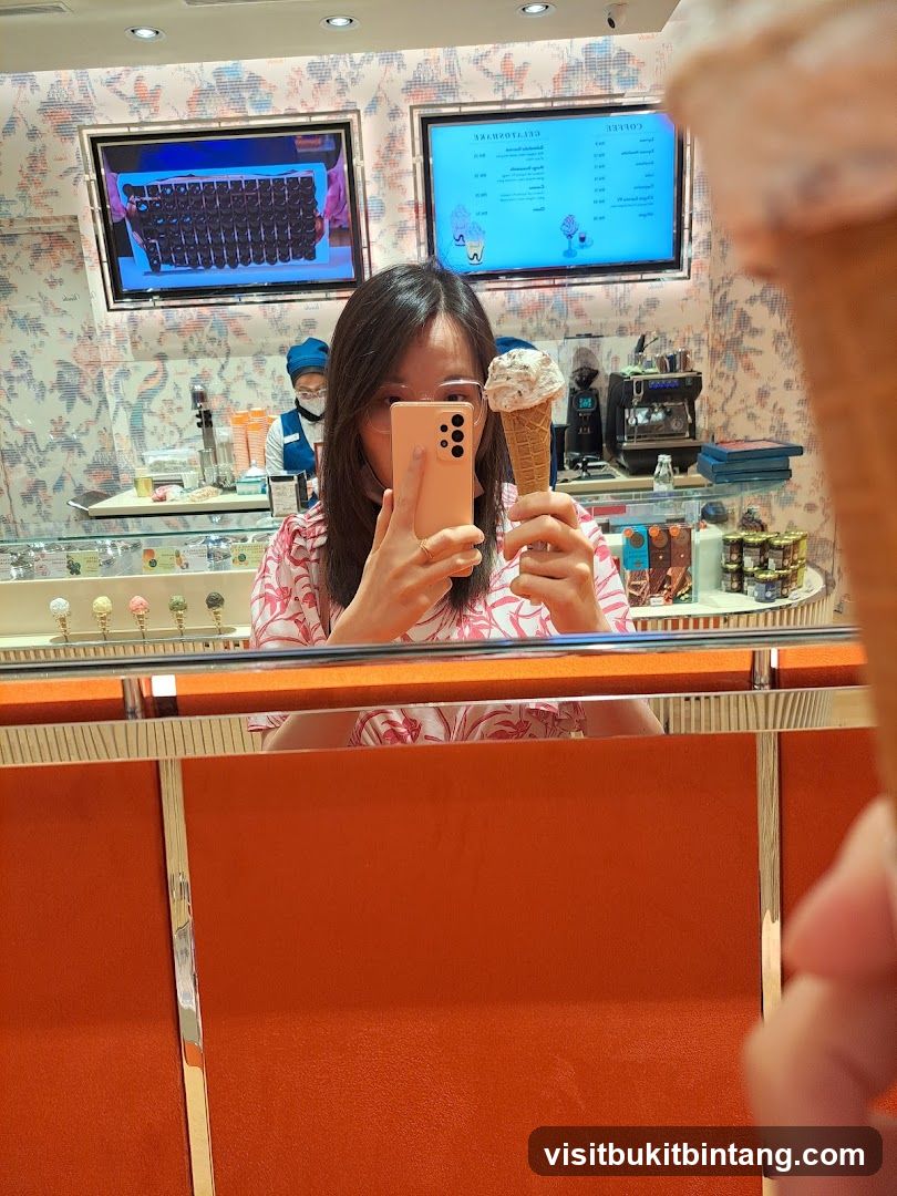 Woman taking a selfie with an ice cream cone
