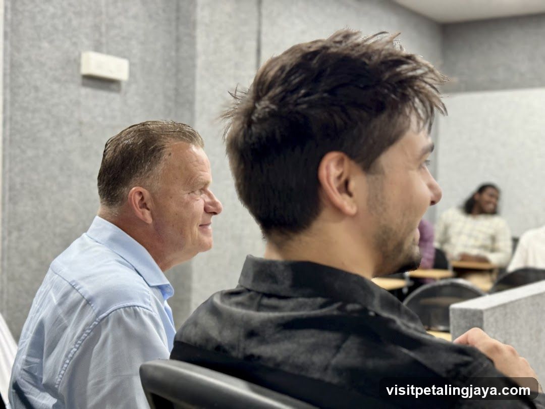 Two men sitting in a room