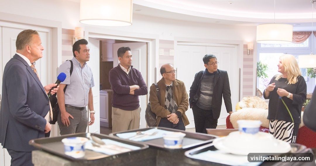 Group in a hotel or care facility room