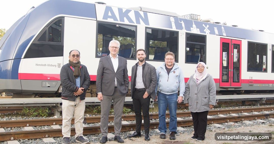 Group of people in front of a train