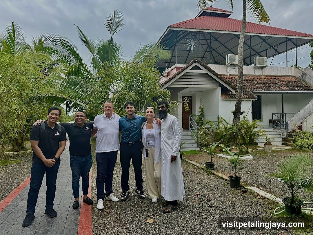 Group photo in tropical setting