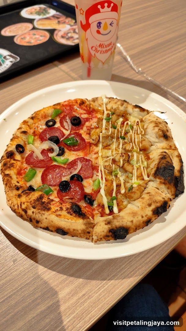 Pizza with mixed toppings and festive drink