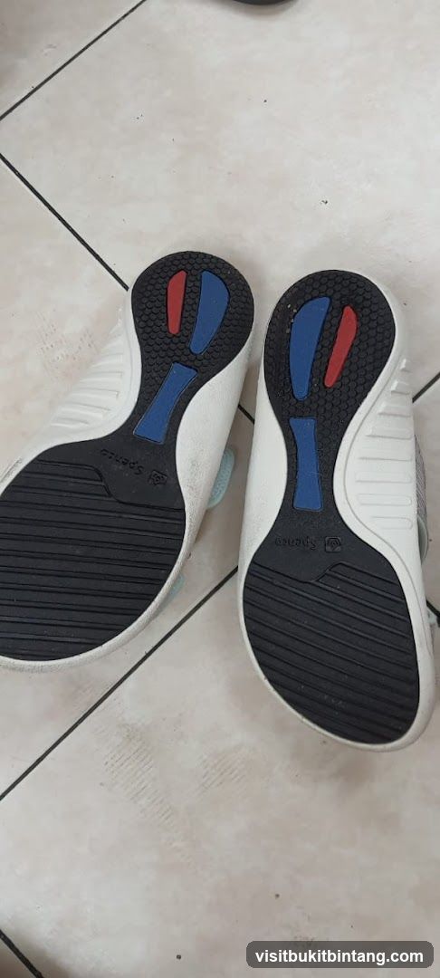 White Shoes with Red and Blue Accents