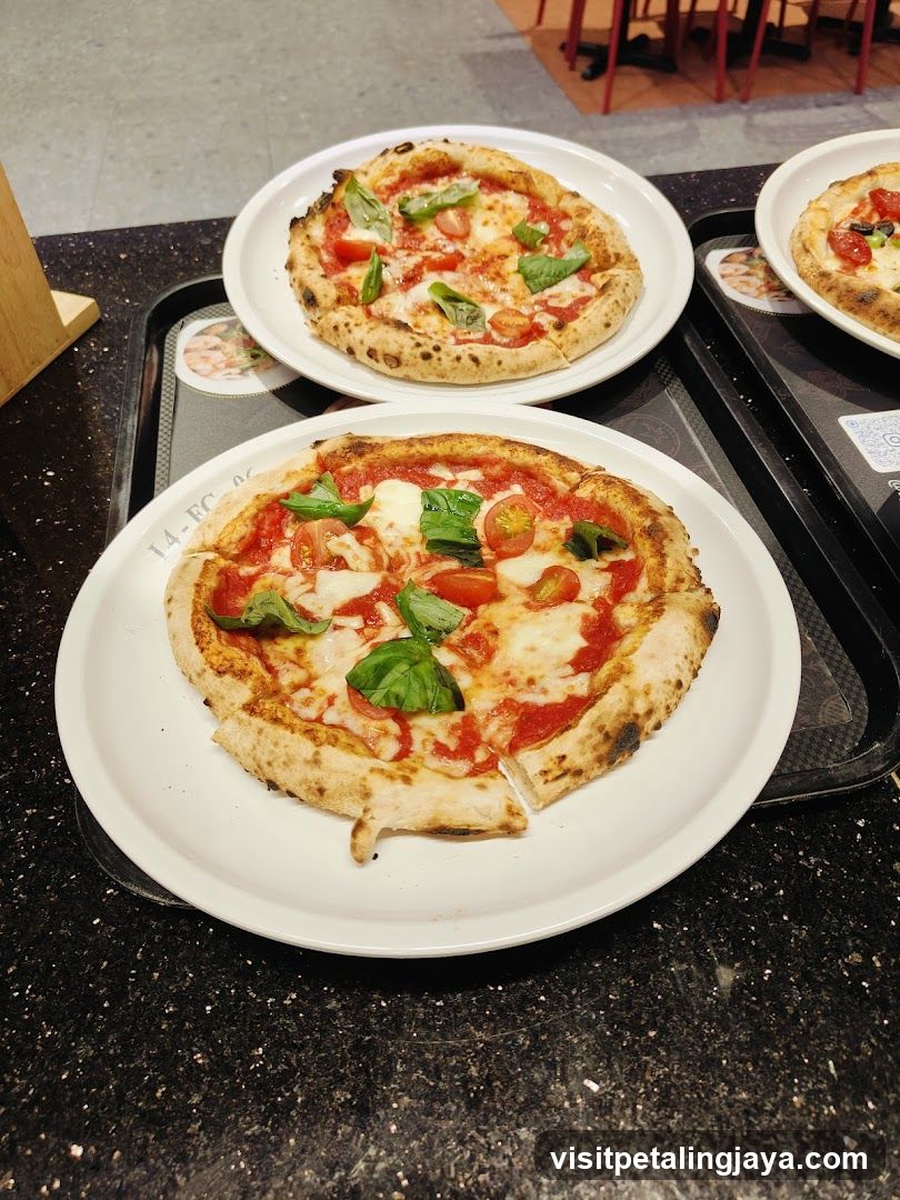 Pizza on plates in a restaurant