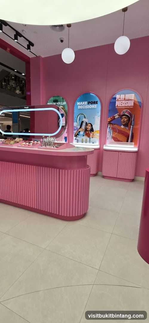 Cosmetics display with pink accents