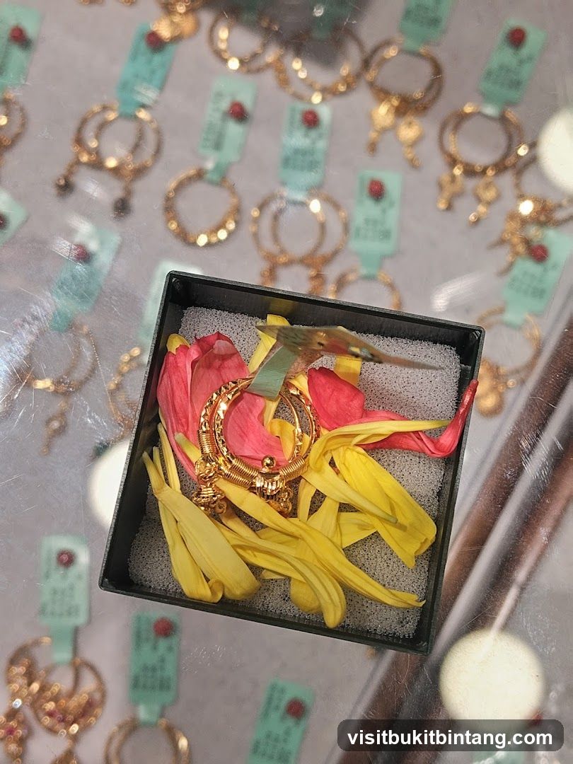 Gold Earrings Displayed with Flower Petals