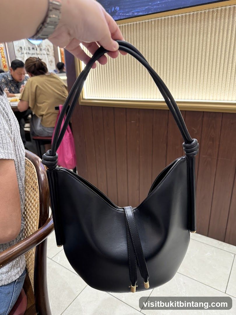 Black Handbag in Restaurant