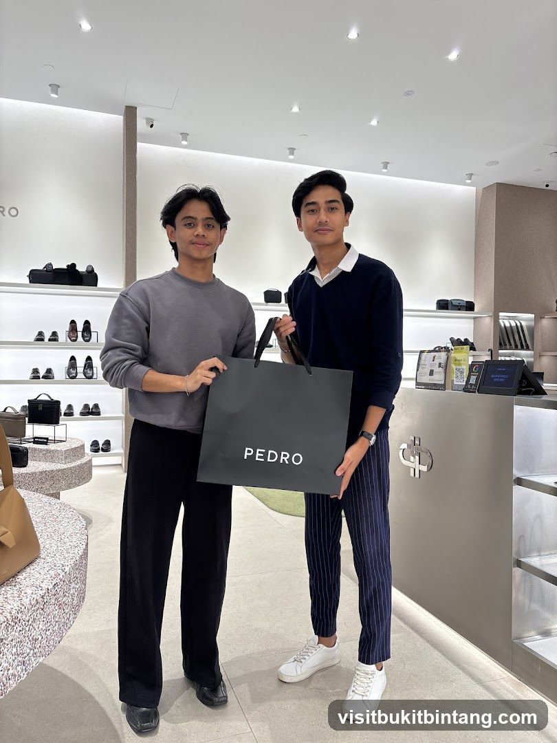 Two young men holding a shopping bag