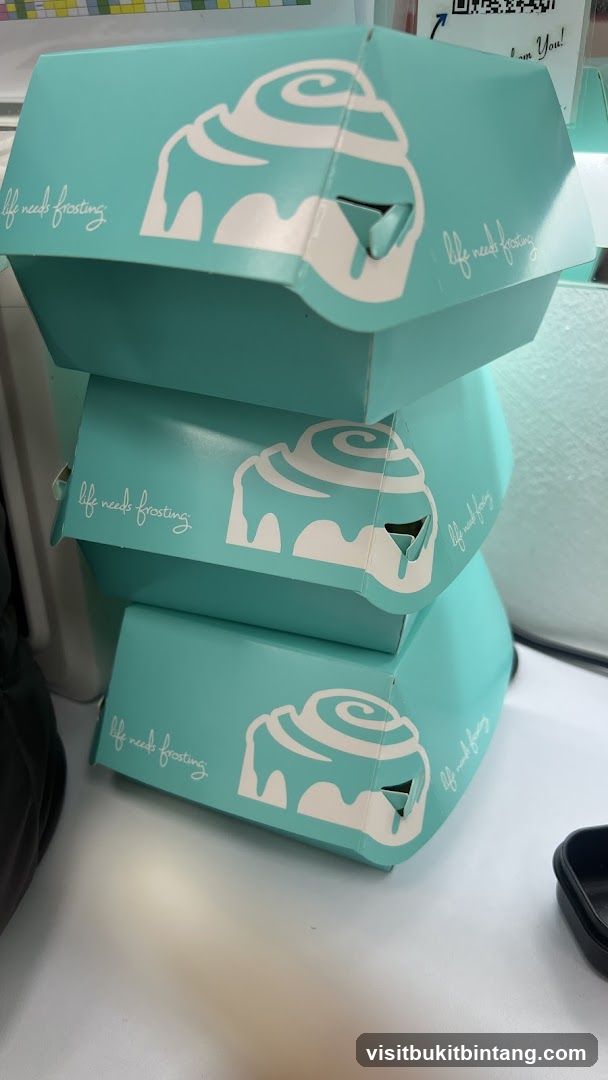 Stack of Cinnamon Roll Boxes